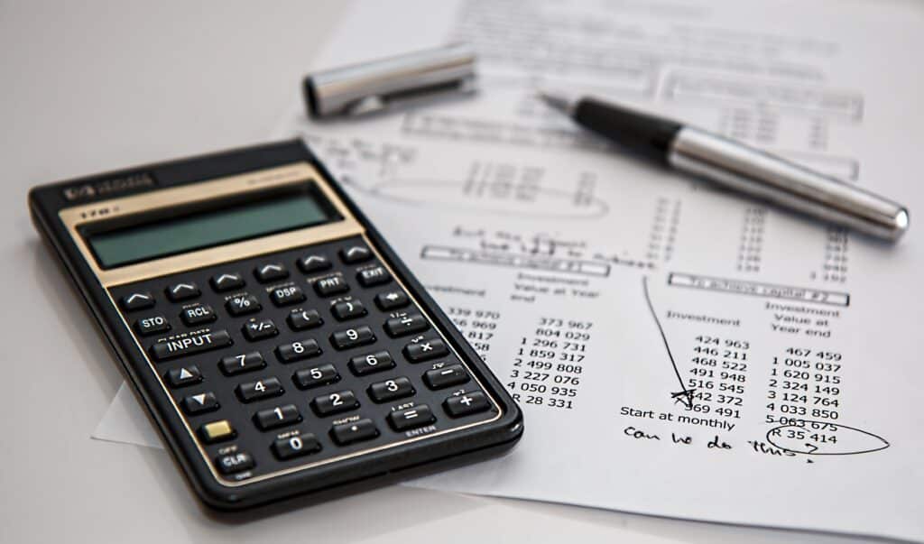 A calculator and pen